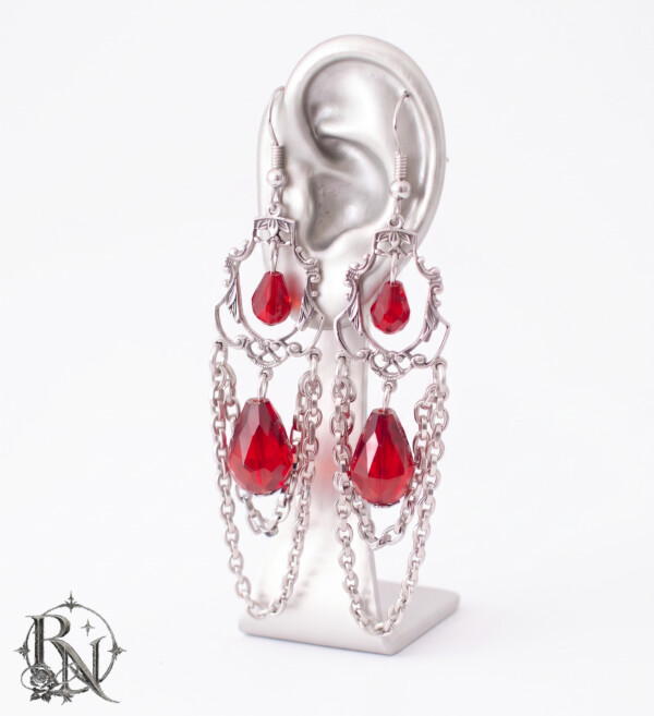 Silver elegant vampire drop earrings
