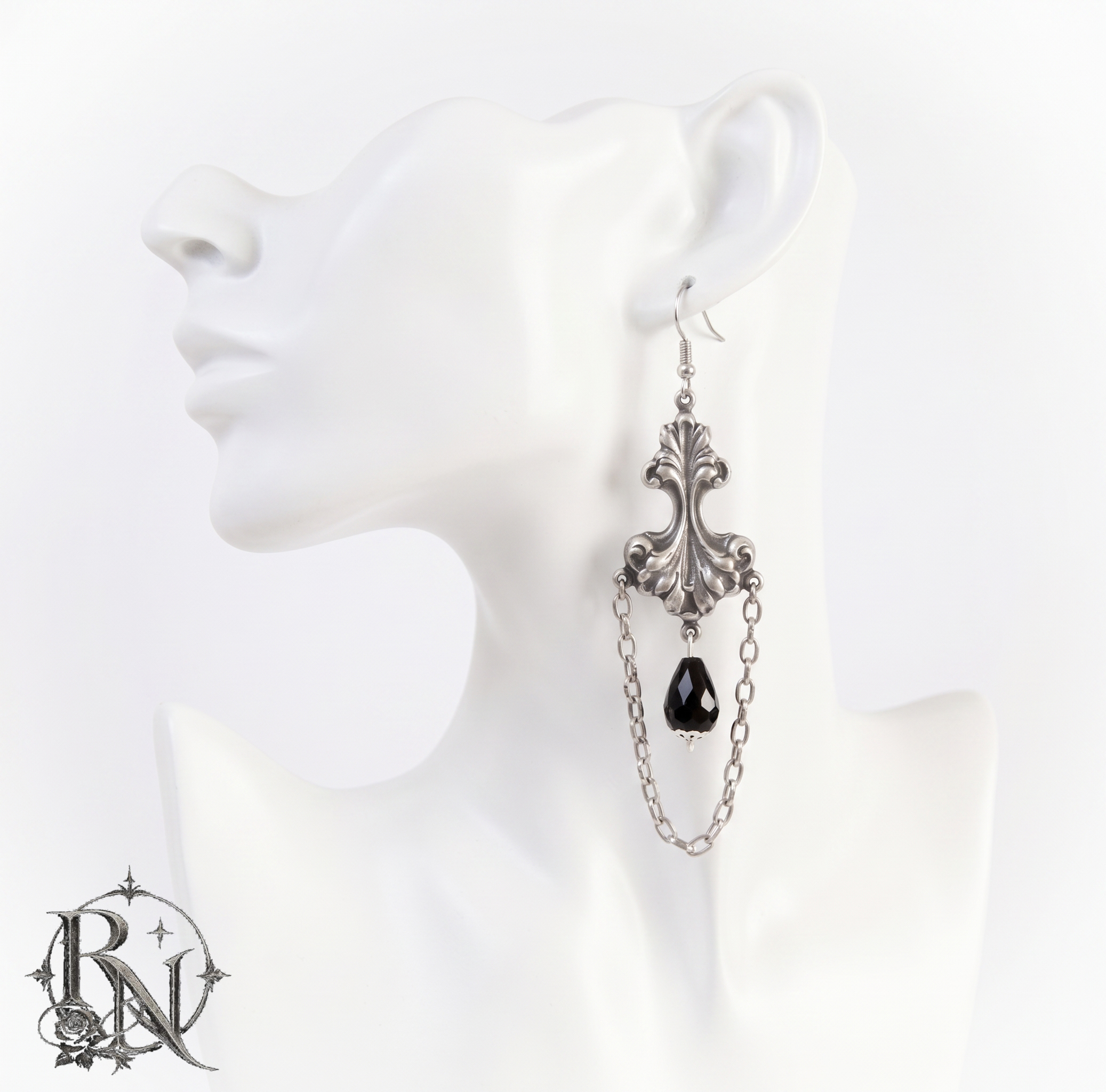 Silver rococo dangle drop earrings with black beads