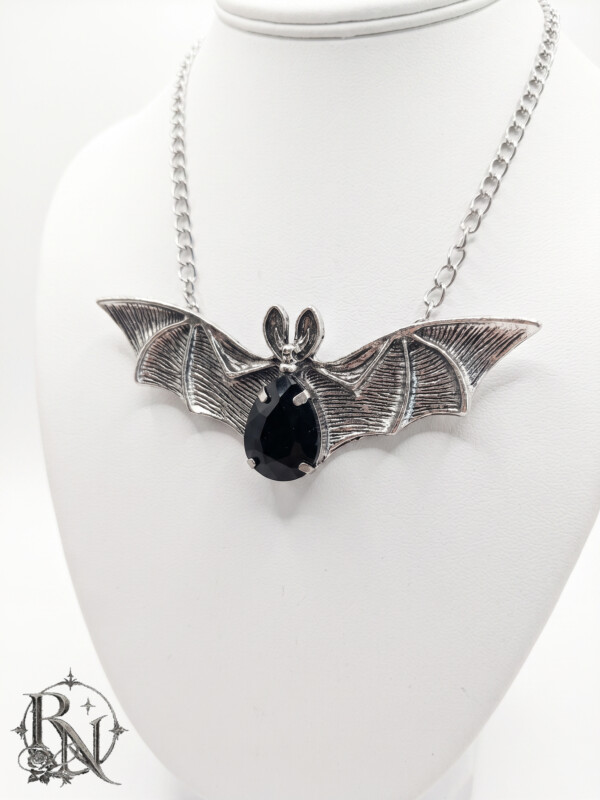 Silver bat gothic pendant with teardrop black gem