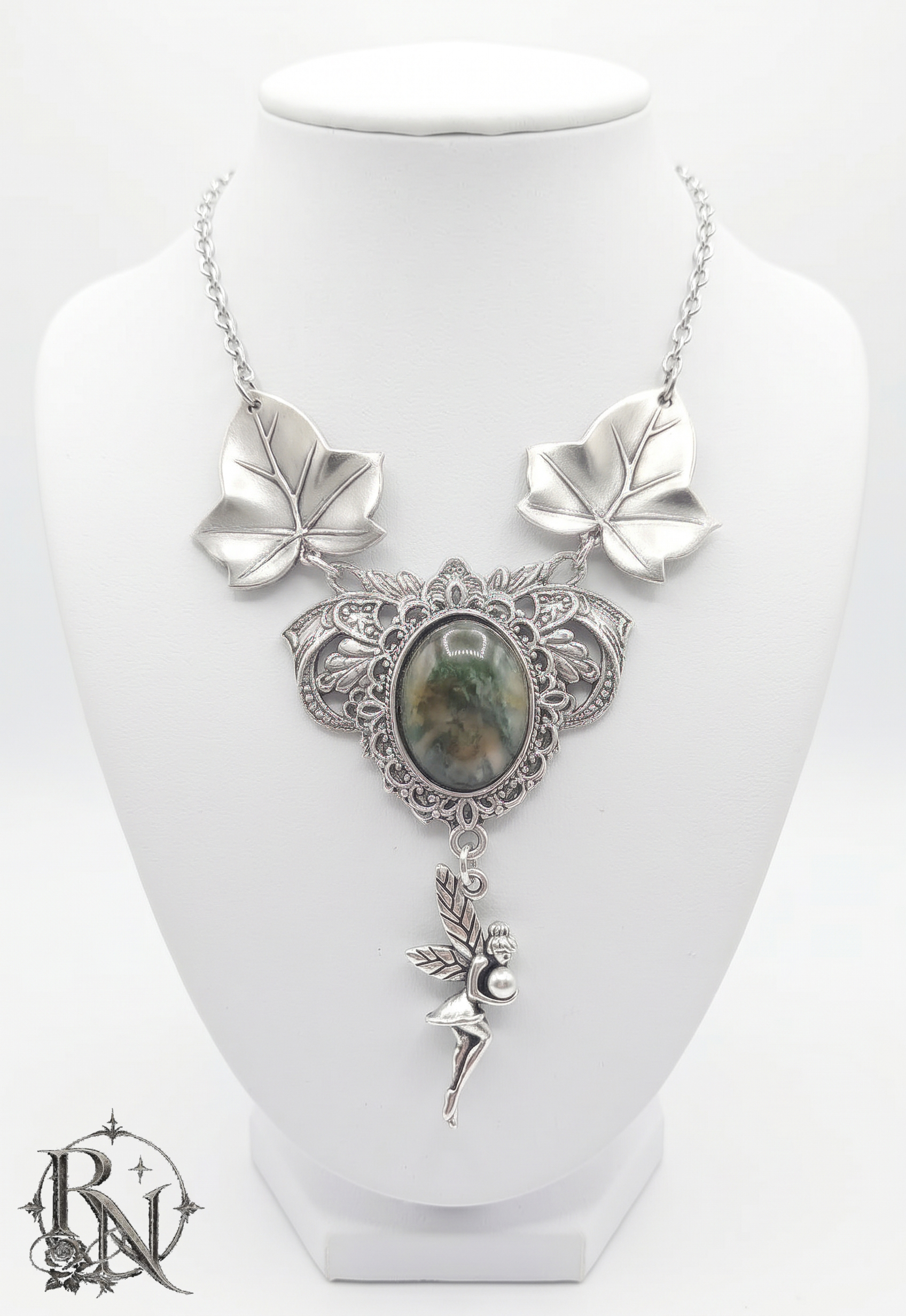 Gothic fairy whimsical necklace with green gem