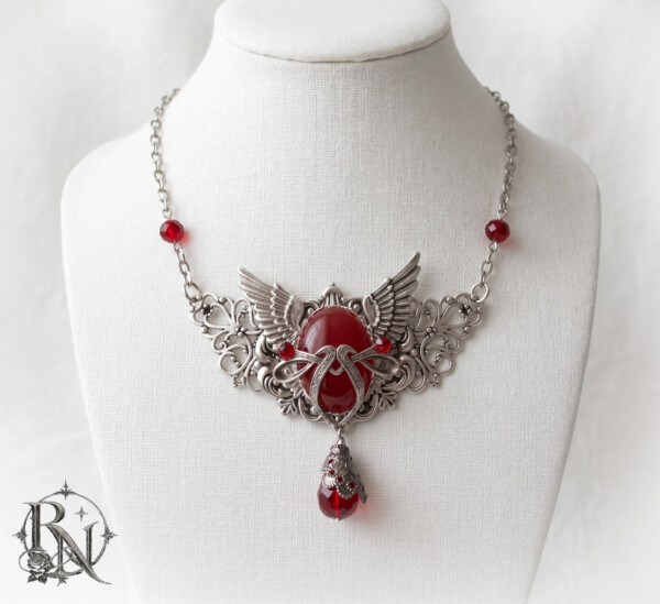 Gothic silver winged pendant with gem